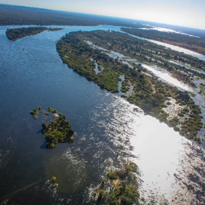 Aerial view of the Zambezi River and islands above Victoria Falls